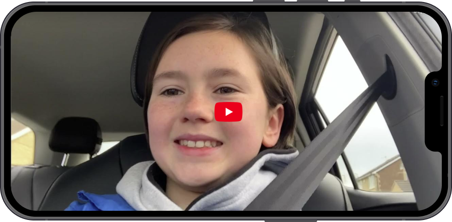 Video thumbnail showing a girl smiling whilst sitting in a car