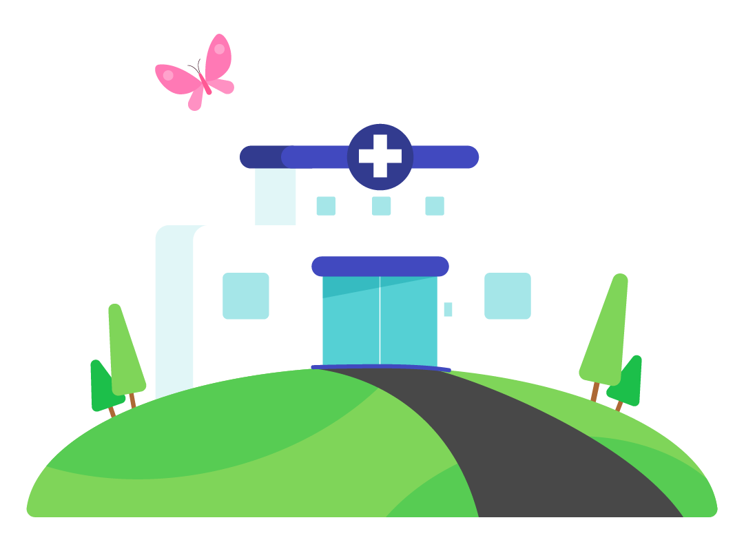 A hospital on top of a hill, on a bright, sunny day.